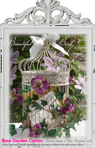 Wedding bird cage decorated with lilac roses trailing ivy