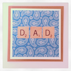 A cool card featuring Paisley print and vintage scrabble piece font.